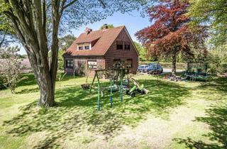 Haus kaufen in 26556 Westerholt, Familienfreundliches Wohnen auf großzügigem Grundstück!