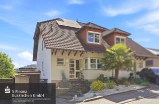 Doppelhaushälfte kaufen in 53894 Mechernich, Mechernich-KommernGeräumige Doppelhaushälfte mit Garage, Garten & unverbaubarer Aussicht!