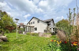 Einfamilienhaus kaufen in 63864 Glattbach, In ruhiger Sackgasse: Großzügiges Einfamilienhaus mit ELW auf traumhaften Südwestgrundstück