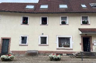 Mehrfamilienhaus kaufen in 97265 Hettstadt, Hettstadt - Mehrfamilienhaus mit Gewerbeeinheit - solide Kapitalanlage