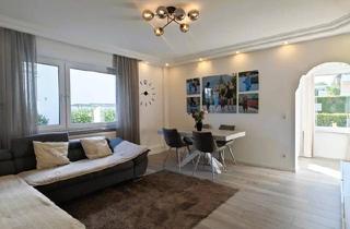 Wohnung kaufen in 65474 Bischofsheim, Bischofsheim - Modernisierte 3-Zimmer-Wohnung mit Garten und Terrasse