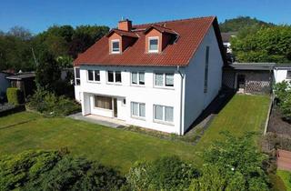 Einfamilienhaus kaufen in 34225 Baunatal, Baunatal - Großes Einfamilienhaus mit vermieteter Einliegerwohnung in Panoramalage von Baunatal-Großenritte!