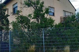 Haus kaufen in 68804 Altlußheim, Altlußheim - Zweifamilienhaus auf großem Grundstück zu verkaufen
