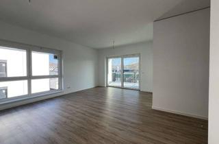Wohnung kaufen in 57290 Neunkirchen, Eigentumswohnung mit Balkon in der neuen Ortsmitte von Neunkirchen!