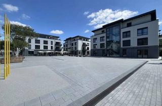 Wohnung kaufen in 57290 Neunkirchen, Eigentumswohnung mit Balkon in der neuen Ortsmitte von Neunkirchen!