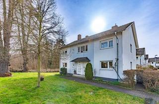 Wohnung kaufen in 53639 Königswinter, Engel & Völkers: EG-Wohnung mit eigenem Garten in Niederdollendorf