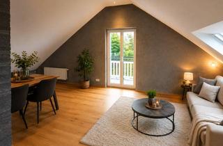 Wohnung kaufen in 94469 Deggendorf, Moderne Dachgeschosswohnung mit Südbalkon und Ausblick über Deggendorf