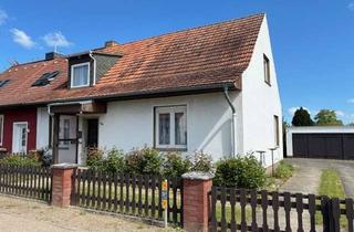 Doppelhaushälfte kaufen in 19057 Lankow, Doppelhaushälfte mit 6 Zimmern, Veranda, Teilkeller, Doppelgarage und großem Grundst