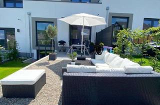 Reihenhaus kaufen in 65207 Naurod, Exklusives Gartenhofhaus mit Garten, 2 Tiefgaragenstellplätzen und moderner Energietechnik