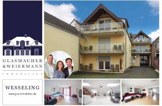 Mehrfamilienhaus kaufen in 50389 Wesseling, Attraktives Mehrfamilienhaus mit Luxus-Penthouse in zentraler Lage in Wesseling