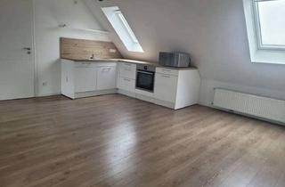 Wohnung kaufen in 47918 Tönisvorst, Modern sanierte DG-Wohnung mit Spitzboden in ruhiger Lage von St. Tönis
