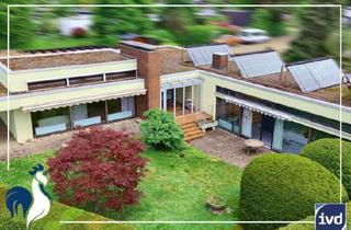 Haus kaufen in Im Steinbühl, 71566 Althütte, Wohnen mit Stil: Architekten-Bungalow mit Sauna, Schwimmhalle, Gartenidylle und Privatsphäre