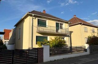 Haus kaufen in 67245 Lambsheim, Zweifamilienhaus in ruhiger Lage mit Bauplatz