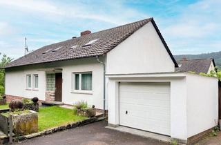 Einfamilienhaus kaufen in 63931 Kirchzell, Großzügiges Wohnhaus mit Ausbaupotenzial in familienfreundlicher Lage