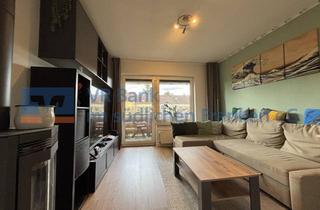 Wohnung kaufen in 91154 Roth, Modernisierte 2-Zimmer-Wohnung mit Balkon und Kaminofen in Roth