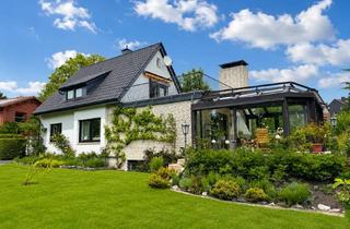 Einfamilienhaus kaufen in 32791 Lage, Charmantes Einfamilienhaus mit Wintergarten, Dachterrasse und gepflegtem Garten!