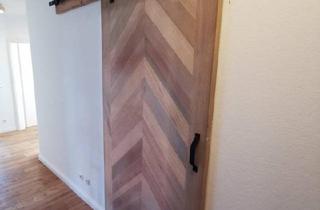 Wohnung kaufen in 24321 Lütjenburg, Lütjenburg - Exklusive Erdgeschosswohnung in ruhiger Sackgassenlage mit Kamin