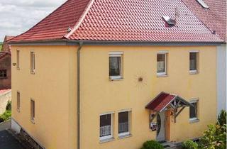 Doppelhaushälfte kaufen in 97447 Frankenwinheim, Gepflegte Doppelhaushälfte mit historischem Charakter und großzügigem Innenhof