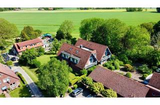 Wohnung kaufen in Küstenstraße 24, 26434 Wangerland, Gemütliche Eigentumswohnung mit Terrasse im idyllischen Wangerland