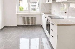 Wohnung kaufen in 84478 Waldkraiburg, Modernisierte 2,5 Zimmer-Wohnung mit Balkon und Einzelgarage