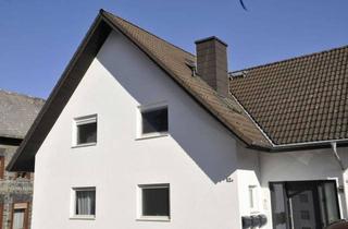 Wohnung kaufen in 65510 Hünstetten, Provisionsfrei-Moderne 3-Zimmer-Maisonettewohnung mit Terrasse und Einzelgarage!