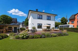 Einfamilienhaus kaufen in 65614 Beselich, behaglich und smart - modernes Einfamilienhaus (A+) mit großzügigen Garten