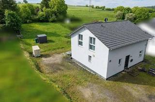 Haus kaufen in 56751 Kollig, Großzügiges Grundstück in ruhiger Ortsrandlage – junge Immobilie mit Erdwärmepumpe!