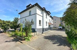 Mehrfamilienhaus kaufen in 65462 Ginsheim-Gustavsburg, Beeindruckendes Mehrfamilienhaus mit Charme, viel Platz & hochwertiger Ausstattung!
