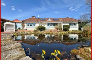 Haus kaufen in 24837 Schleswig, Zeitlose, prägnante Architektur mit offener Raumgestaltung & Gartenidylle
