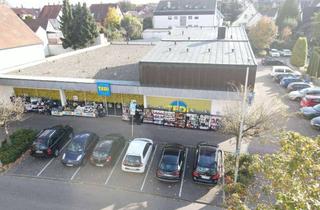 Gewerbeimmobilie kaufen in 74211 Leingarten, Faktor 13! Langfristig vermietete Ladenfläche mit Penthouse-Wohnung