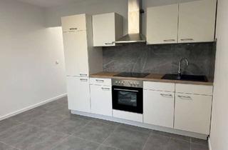 Wohnung kaufen in Ammerweg 1 B, 51647 Gummersbach, Modernisierte 3-Zimmer-Erdgeschosswohnung mit Balkon, Stellplatz und Einbauküche