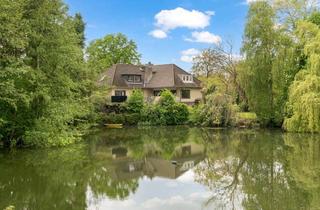 Haus kaufen in 22955 Hoisdorf, Exklusives Wohnen am Wasser-stilvolles Refugium mit eigenem Teichanteil und Panoramaterrasse