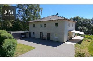 Einfamilienhaus kaufen in 91257 Pegnitz, KfW-55-Einfamilienhaus mit Einliegerwohnung und großzügigem Grundstück