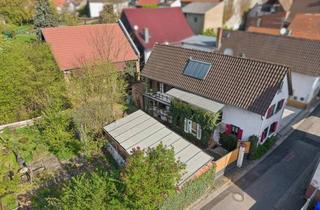 Haus kaufen in 61200 Wölfersheim, Verträumte Immobilie zum Wohlfühlen
