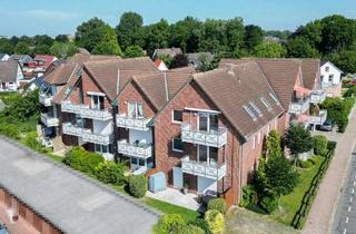 Wohnung kaufen in 25761 Büsum, Charmante Dachgeschosswohnung auf Eigenland in zentraler Lage von Büsum