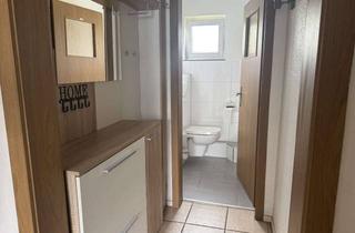 Wohnung kaufen in 59073 Heessen, Stilvolle 4-Zimmer-Eigentumswohnung mit Balkon, Carport und modernisierter Ausstattung