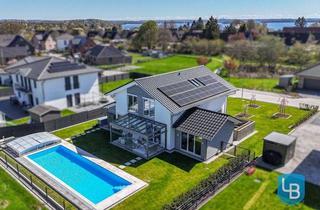 Einfamilienhaus kaufen in 24326 Ascheberg, Neuwertiges Traumhaus mit Pool nahe dem Großen Plöner See