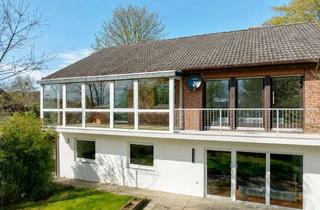 Haus kaufen in 56355 Hunzel, Freistehendes EFH bei Nastätten mit vermieteter Einliegerwohnung, Wintergarten und Doppelgarage