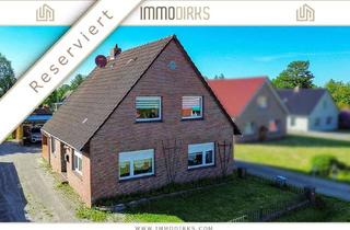 Einfamilienhaus kaufen in 26826 Weener, Weener:Charmantes Einfamilienhaus mit Gartenhütte, Doppelgarage und großzügigem Grundstück