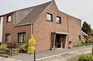 Doppelhaushälfte kaufen in 27711 Osterholz-Scharmbeck, Charmante Doppelhaushälfte mit großer Garage, überdachter Terrasse und Loggia