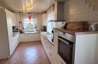 Einfamilienhaus kaufen in 49549 Ladbergen, Energieeffizientes freistehendes Einfamilienhaus mit Einblasdämmung und moderner Wärmepumpe.