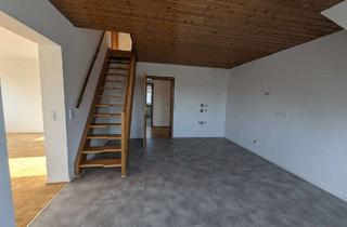 Wohnung kaufen in 85399 Hallbergmoos, Attraktives Investment: 4-Zimmer-Maisonette mit Balkon und ca. 4 % Rendite