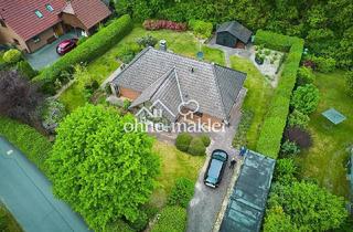 Einfamilienhaus kaufen in 21256 Handeloh, Wohnen am Waldrand und mitten im Dorf - Haus mit Wintergarten und Ausbaureserve in Handeloh