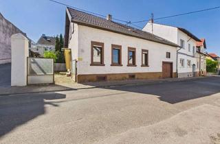 Haus kaufen in 55424 Münster-Sarmsheim, Charmantes Wohnhaus mit Hof und Garage zum Kauf in Münster-Sarmsheim