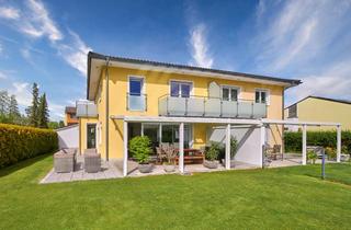 Einfamilienhaus kaufen in 82166 Gräfelfing, Großzügige Doppelhaushälfte mit hochwertiger Ausstattung, wohnlichem Hobbyraum und Wellnessbereich