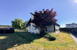 Haus kaufen in 91093 Heßdorf, Großzügiges Zweifamilienhaus mit Traumgarten, Balkon, Wintergarten & Doppelgarage