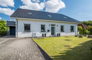 Einfamilienhaus kaufen in 27612 Loxstedt, Loxstedt - Raum für Familie, Arbeit und Zukunft - großzügiges Effizienzhaus