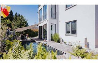 Wohnung kaufen in 79206 Breisach, Exklusive Erdgeschosswohnung mit asiatischem Gartenflair in zentraler Lage