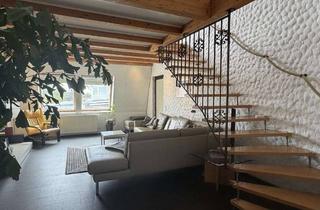 Wohnung kaufen in 61130 Nidderau, Stilvolle Maisonettewohnung mit offenem Wohnbereich und Galeriecharakter in Heldenbergen