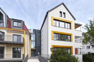 Wohnung kaufen in 36088 Hünfeld, Großenbacher Tor - Exklusives Wohnen mit Neu- und Altbaucharakter im Herzen von Hünfeld